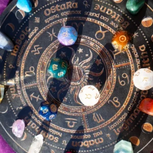 Mystical symbols with stones and polyhedral dice