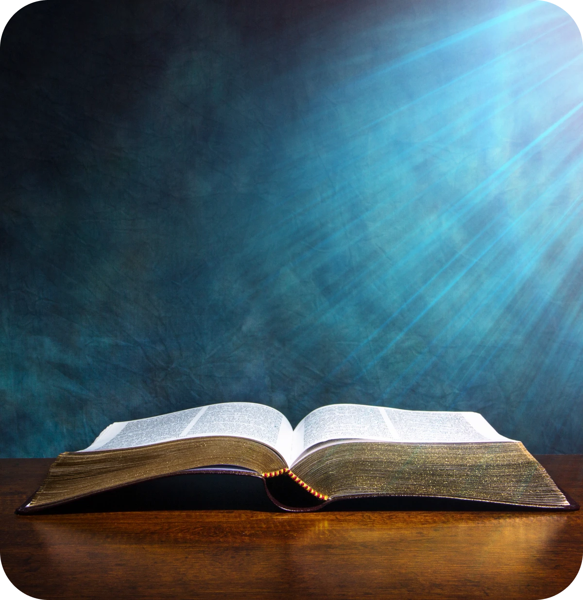 Open book with light rays